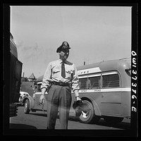 [Untitled photo, possibly related to: Columbus, Ohio. Randy Pribble, a bus driver for the Pennsylvania Greyhound Company]. Sourced from the Library of Congress.