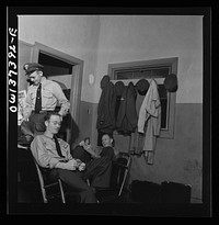 [Untitled photo, possibly related to: Columbus, Ohio. Greyhound bus drivers resting in the drivers' room]. Sourced from the Library of Congress.