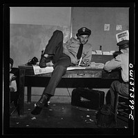 Columbus, Ohio. Greyhound bus drivers waiting for their runs in the drivers' room. Sourced from the Library of Congress.