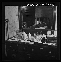 [Untitled photo, possibly related to: Pittsburgh, Pennsylvania. Hotel room where Clem Carson, a Greyhound driver, lives and which he shares with another bus driver. They each pay six dollars a week]. Sourced from the Library of Congress.