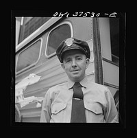 [Untitled photo, possbly related to: Bernard Cochran, Greyhound bus driver. He has a perfect record of fourteen years, never having had an accident while driving a bus]. Sourced from the Library of Congress.
