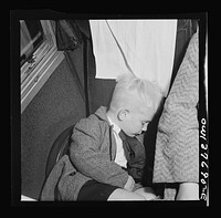 Passengers on a Greyhound bus bound for Chicago, Illinois from Cincinnati, Ohio at two a.m.. Sourced from the Library of Congress.