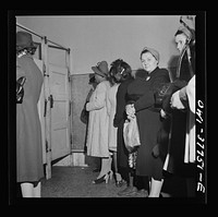 Indianapolis, Indiana. Bus passengers waiting in line to use the free toilet in the ladies' restroom at the Greyhound bus terminal. Sourced from the Library of Congress.