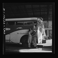 Indianapolis, Indiana. A soldier and a girl saying goodbye at the Greyhound bus station. Sourced from the Library of Congress.