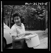 Interracial activities at Camp Ellen Marvin, where children are aided by the Methodist Camp Service. Miss Sumi Yumaguchi, Japanese dietican. Arden, New York. Sourced from the Library of Congress.
