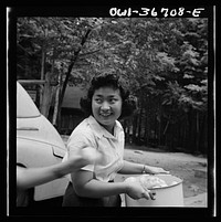 [Untitled photo, possibly related to: Interracial activities at Camp Ellen Marvin, where children are aided by the Methodist Camp Service. Miss Sumi Yumaguchi, Japanese dietican. Arden, New York]. Sourced from the Library of Congress.