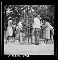 Arden, New York. Interracial activities at Camp Ellen Marvin, where children are aided by the Methodist Camp Service. Mothers supervising their children who are playing in a jungle gym. Sourced from the Library of Congress.