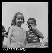 Haverstraw, New York. Interracial activities at Camp Christmas Seals, where children are aided by the Methodist Camp Service. Camp buddies. Sourced from the Library of Congress.