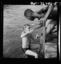 Southfields, New York. Interracial activities at Camp Nathan Hale, where children are aided by the Methodist Camp Service. A scene at the swimming dock. Sourced from the Library of Congress.