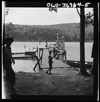 Southfields, New York. Interracial activities at Camp Nathan Hale, where children are aided by the Methodist Camp Service. A view of the lake and swimming activities. Sourced from the Library of Congress.