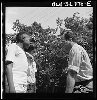 Southfields, New York. Interracial activities at camp Nathan Hale, where children are aided by the Methodist Camp Service. Instructions being given to the campers by Milton Reiner, program director. Sourced from the Library of Congress.