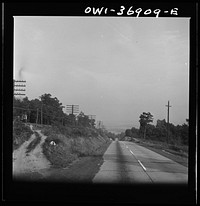 [Untitled photo, possibly related to: A Greyhound bus going from Washington, D.C. to Pittsburgh, Pennsylvania on a highway in Pennsylvania]. Sourced from the Library of Congress.