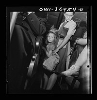 Passengers standing in the aisle of a Greyhound bus going from Washington, D.C. to Pittsburgh, Pennsylvania. Sourced from the Library of Congress.