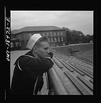 Washington, D.C. A sailor who graduated in June, home on his first leave, visiting at Woodrow Wilson High School. Sourced from the Library of Congress.