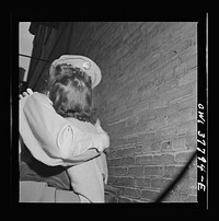 Chicago, Illinois. Private D.N. Daniels kissing his wife goodbye at the Greyhound bus terminal. Sourced from the Library of Congress.
