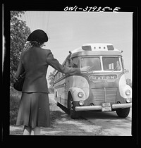 A Greyhound bus trip from Louisville, Kentucky, to Memphis, Tennessee, and the terminals. Hailing a Macon-bound bus on the highway in Georgia. Sourced from the Library of Congress.