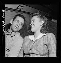 A Greyhound bus trip from Louisville, Kentucky, to Memphis, Tennessee, and the terminals. A beautiful friendship formed on the bus. The girl is returning home after trying to get a defense job in Ohio, the soldier is on the way to a hospital. Louisville- Nashville bus. Sourced from the Library of Congress.