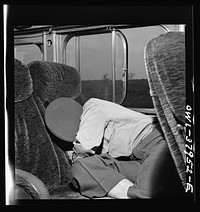 A Greyhound bus trip from Louisville, Kentucky, to Memphis, Tennessee, and the terminals. Sleeping soldier on Greyhound bus enroute from Louisville to Nashville. Sourced from the Library of Congress.