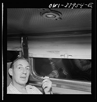 A Greyhound bus trip from Louisville, Kentucky, to Memphis, Tennessee, and the terminals. A travelling salesman. He now uses the bus instead of an automobile. En route Memphis to Chattanooga by Greyhound. Sourced from the Library of Congress.