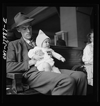 A Greyhound bus trip from Louisville, Kentucky, to Memphis, Tennessee, and the terminals. Bus passengers in waiting room at Nashville. Sourced from the Library of Congress.