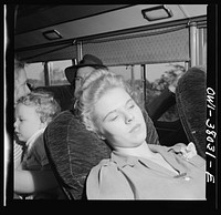 A Greyhound bus trip from Louisville, Kentucky, to Memphis, Tenness, and the terminals. Passenger on Louisville-Nashville bus. She is on her way to be married. Sourced from the Library of Congress.