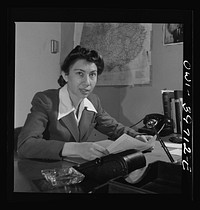 [Untitled photo, possibly related to: Elaine Harris, Administrative Assistant to George E. Taylor, Assistant Deputy Director for Pacific Operations. Far East Section, Overseas Branch, Office of War Information]. Sourced from the Library of Congress.