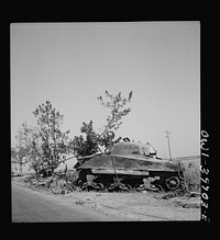 Catania (vicinity), Sicily. A General Sherman tank and a German 88 mm. gun. Sourced from the Library of Congress.