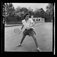 Washington, D.C. Sally Dessez, a student at Woodrow Wilson High School, playing a tennis match. Sourced from the Library of Congress.