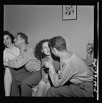 Two corporals and their girls at a party. Washington, D.C.. Sourced from the Library of Congress.