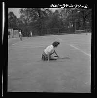 Washington, D.C. Sally Dessez, a student at Woodrow Wilson High School, playing a tennis match. Sourced from the Library of Congress.