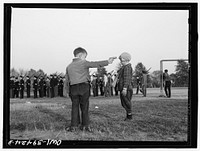 Washington, D.C. Small boys watching the Woodrow Wilson high school cadets. Sourced from the Library of Congress.