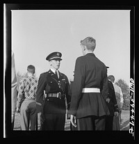 Washington, D.C. Walter Spangenberg, a captain in the cadet corps at Woodrow Wilson High School, giving instructions to a member of his company. Sourced from the Library of Congress.