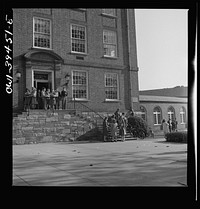 Washington, D.C. Woodrow Wilson High School students leaving the building at the end of the school day. Sourced from the Library of Congress.