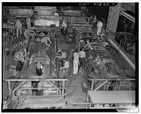 [Untitled photo, possibly related to: Boeing aircraft plant, Seattle, Washington. Production of B-17F (Flying Fortress) bombing planes. Fuselage sections.]. Sourced from the Library of Congress.