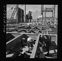 Bingham Canyon, Utah. Building a trestle bridge at the open-pit mines of the Utah Copper Company. Sourced from the Library of Congress.