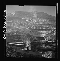 [Untitled photo, possibly related to: Bingham Canyon, Utah. Open-pit workings of the Utah Copper Company, showing loaded ore trains in the foreground]. Sourced from the Library of Congress.