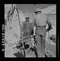 Bingham Canyon, Utah. Drilling blast holes with a rock-drill machine in an open-pit mine operated by the Utah Copper Company. Sourced from the Library of Congress.