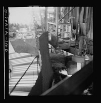 [Untitled photo, possibly related to: Phelps Dodge refining company, El Paso, Texas. Sheets of pure copper, which had been formed by electrolysis in huge tanks, being melted now and cast into ingots]. Sourced from the Library of Congress.