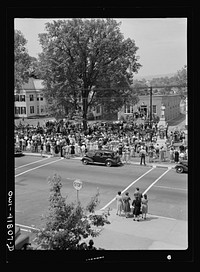 [Untitled photo, possibly related to: Southington, Connecticut. An American town and its way of life. The Memorial Day parade moving down the main street. The small number of spectators is accounted for by the fact that the town's war factories did not close]. Sourced from the Library of Congress.