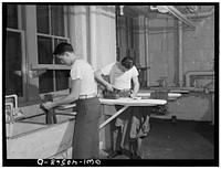 [Untitled photo, possibly related to: Washington, D.C. Servicemen using the laundry facilities in the sub-basement of the United Nations service center. It is not necessary to engage a hotel room in order to use these accomodations]. Sourced from the Library of Congress.