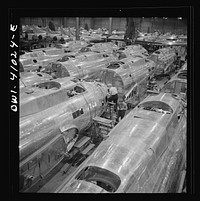 [Untitled photo, possibly related to: Boeing aircraft plant, Seattle, Washington. Production of B-17F (Flying Fortress) bombing planes. Fuselage sections]. Sourced from the Library of Congress.