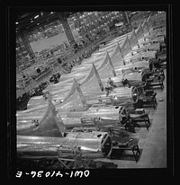 [Untitled photo, possibly related to: Boeing aircraft plant, Seattle, Washington. Production of B-17F (Flying Fortress) bombing planes. Tail section of B-17F (Flying Fortress) bombers]. Sourced from the Library of Congress.