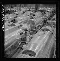 [Untitled photo, possibly related to: Boeing aircraft plant, Seattle, Washington. Production of B-17F (Flying Fortress) bombing planes. Fuselage sections]. Sourced from the Library of Congress.