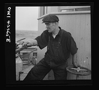 On board a fishing vessel out from Gloucester, Massachusetts. Operating the winch. Sourced from the Library of Congress.