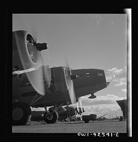 [Untitled photo, possibly related to: Production. B-17 heavy bomber. Two of the four mighty engines of a new B-17F (Flying Fortress) bombers warm up at the airfield of Boeing's Seattle plant as another warship of the air awaits its flight test. The Flying Fortress has performed with great credit in the South Pacific, over Germany and elsewhere. It is a four-engine heavy bomber capable of flying at high altitudes]. Sourced from the Library of Congress.