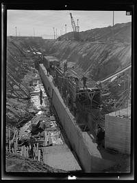 [Untitled photo, possibly related to: Columbia Steel Company at Geneva, Utah. Constructing a water intake tunnel for a new steel plant which will make important additions to the vast amount of steel needed for the war effort]. Sourced from the Library of Congress.