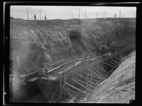 [Untitled photo, possibly related to: Columbia Steel Company at Geneva, Utah. Constructing a water intake tunnel for a new steel plant which will make important additions to the vast amount of steel needed for the war effort]. Sourced from the Library of Congress.