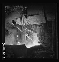 Columbia Steel Company at Ironton, Utah. Inside the cast house of the blast furnace. Sourced from the Library of Congress.