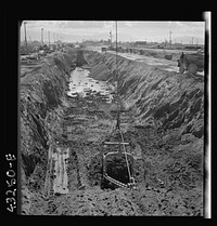 [Untitled photo, possibly related to: Columbia Steel Company at Geneva, Utah. Drag lines are working day and night excavating for the building of open hearth furnaces for a new steel mill which will make important additions to the vast amount of steel needed for the war effort]. Sourced from the Library of Congress.