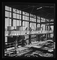 Las Vegas, Nevada. A construction scene at the Basic Magnesium Incorporated plant in the southern Nevada desert, showing workmen engaged in the steel structure of one of the chlorination plants. Sourced from the Library of Congress.
